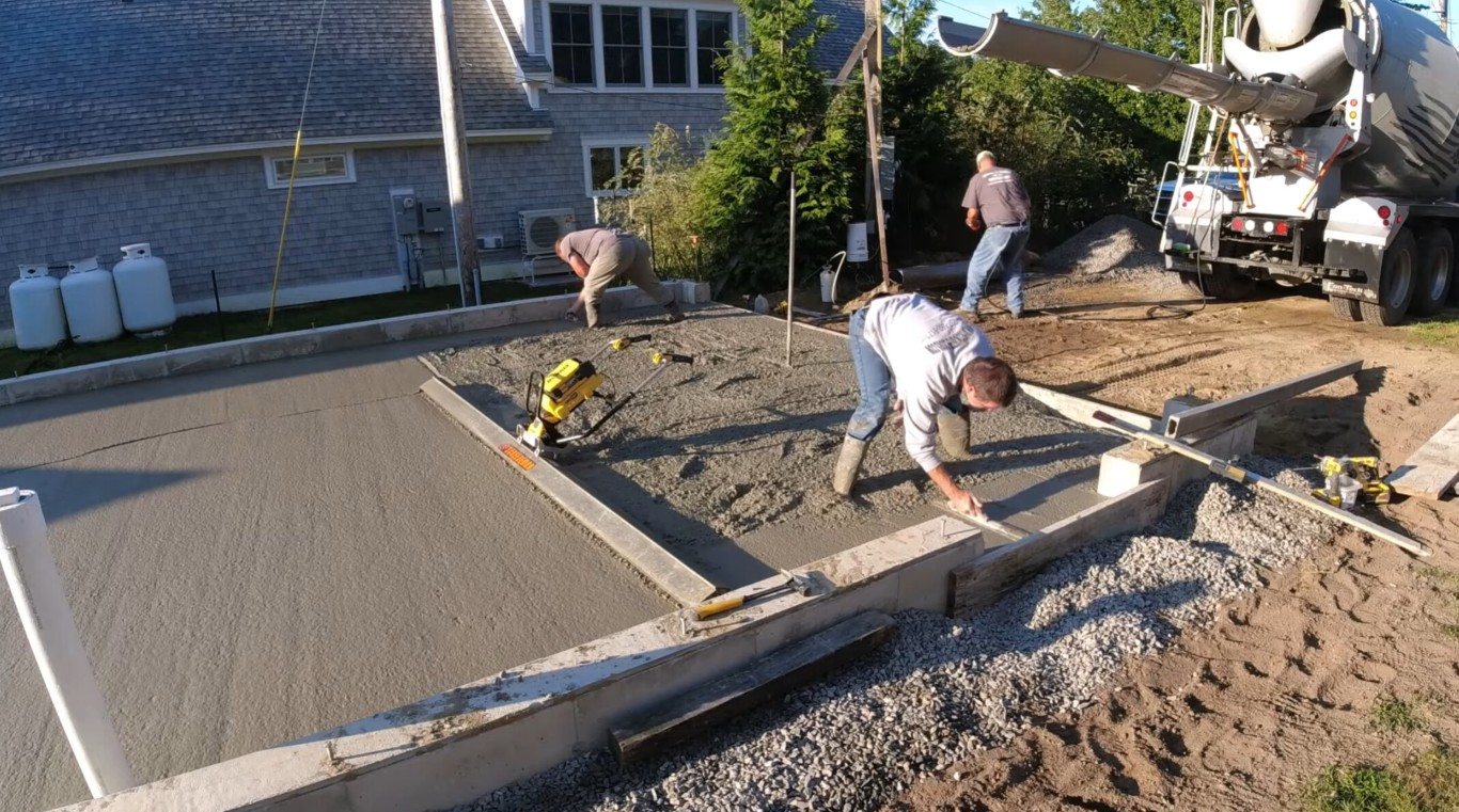 Professional concrete crew pouring driveway in Chino Hills, CA